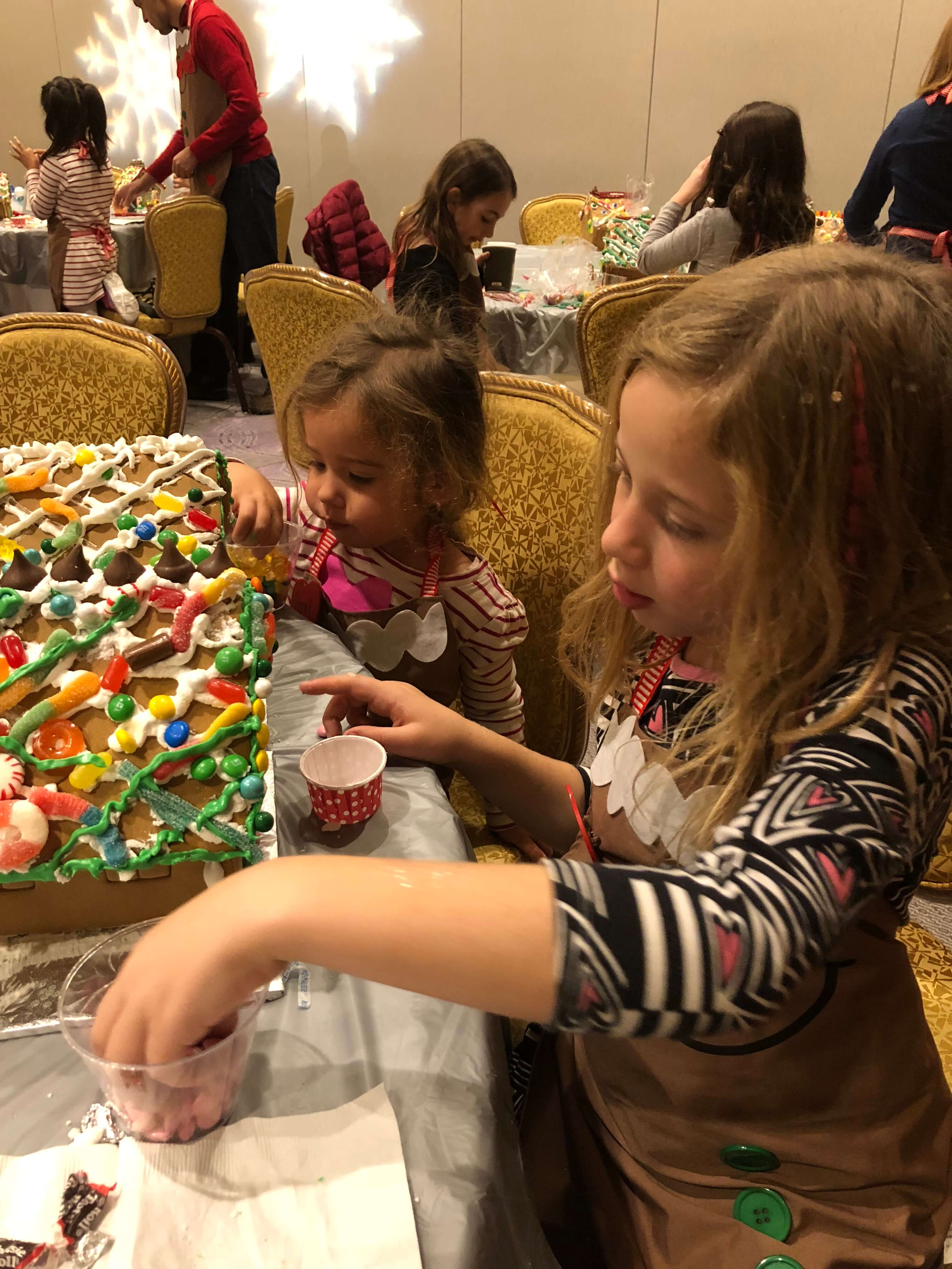 gingerbread house decorating adding icing westchester events process